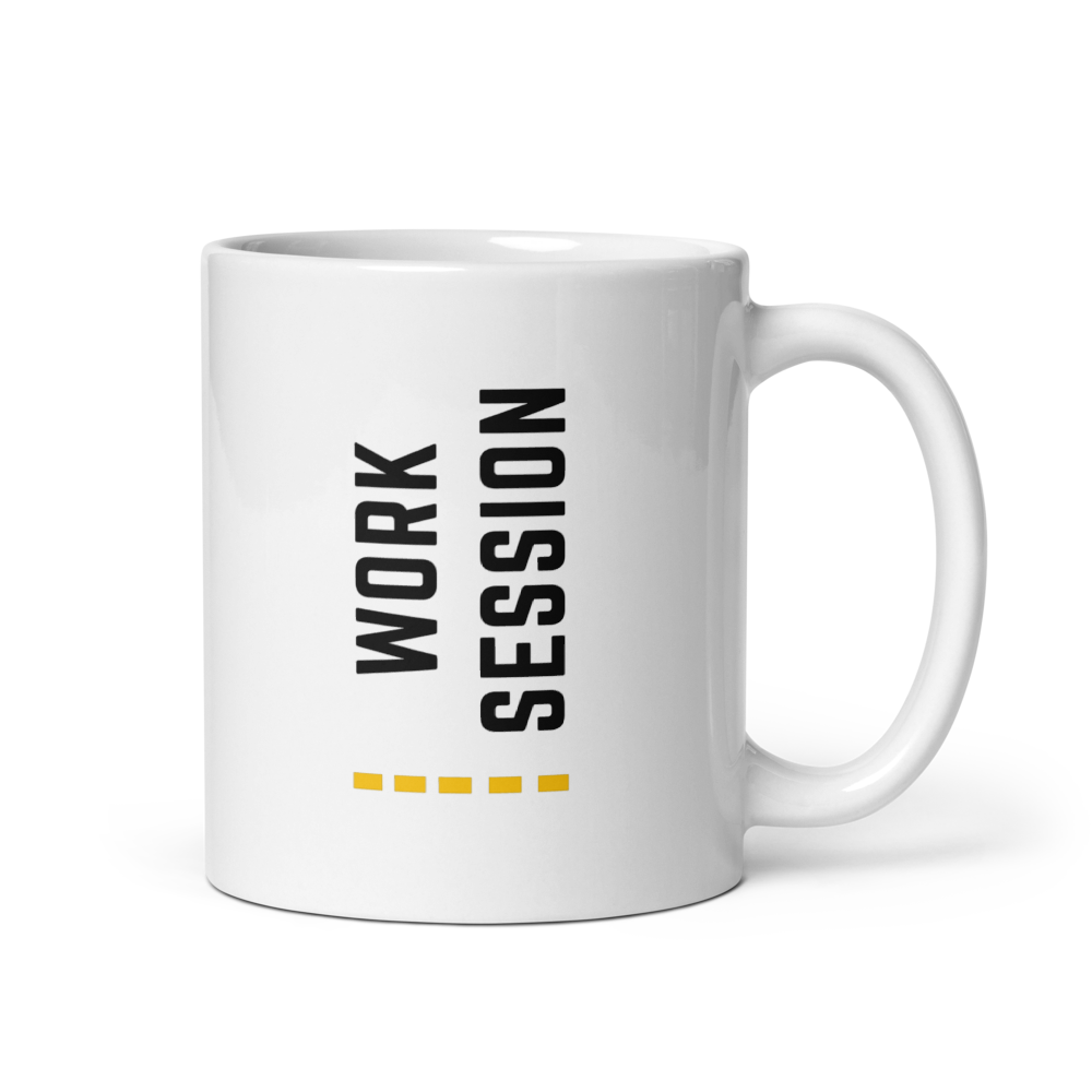 White ceramic coffee mug with vertical minimalist text and gold icon.