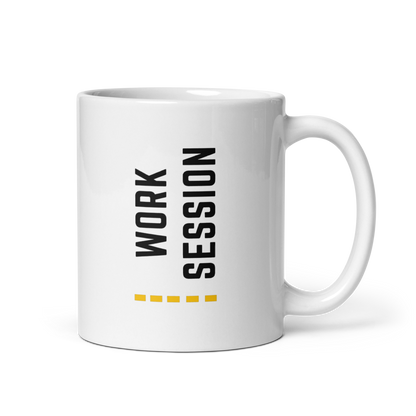 White ceramic coffee mug with vertical minimalist text and gold icon.