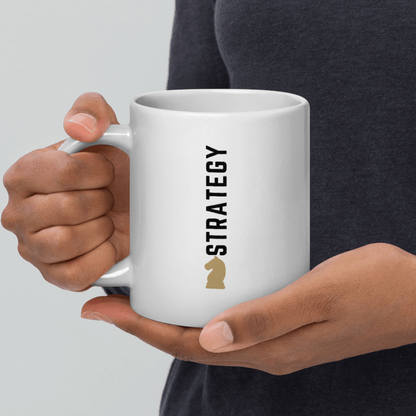 Strategy Executive Mug being held in hand showing STRATEGY vertical typography and chess icon lifestyle shot