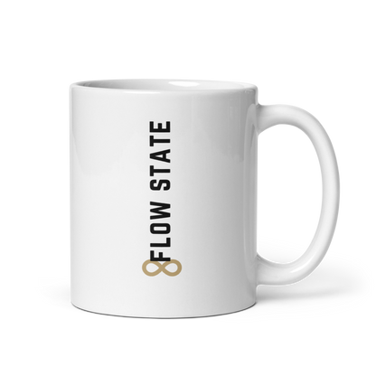 White ceramic coffee mug with vertical minimalist text and gold icon.