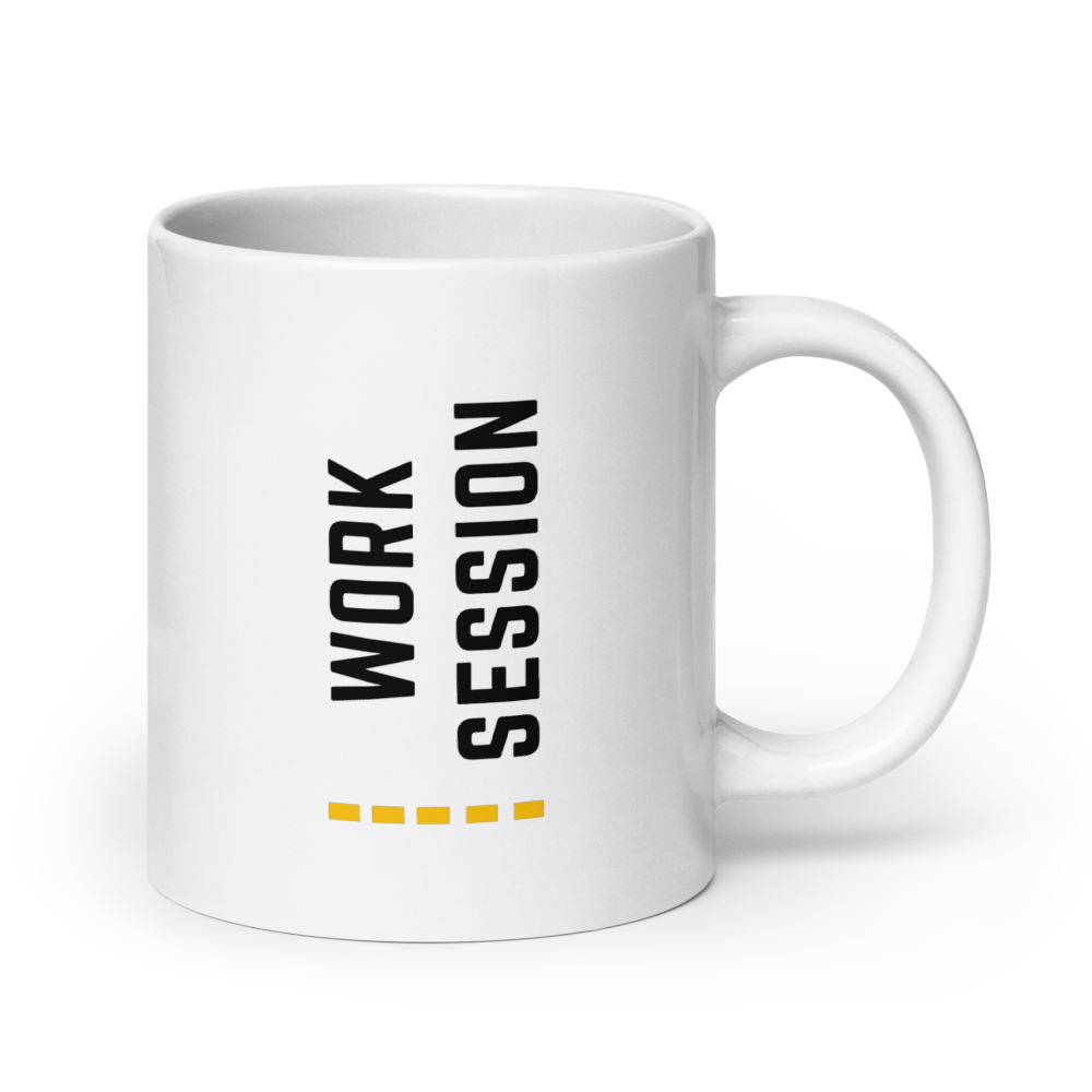 White ceramic coffee mug with vertical minimalist text and gold icon.