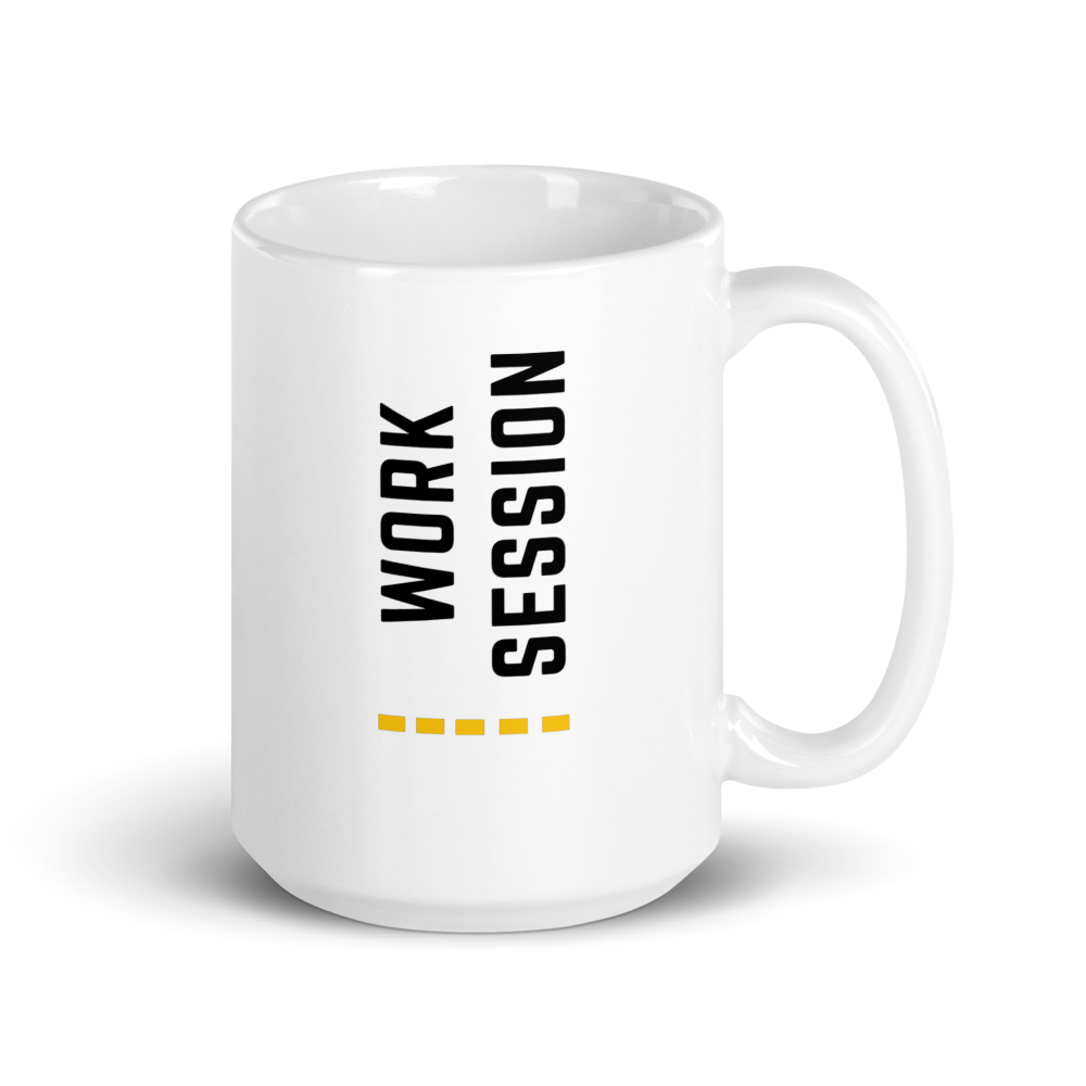 White ceramic coffee mug with vertical minimalist text and gold icon.